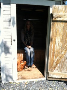 I am sitting with dignity on a 100 year old outhouse toilet (not actually in use)