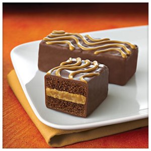 The Best of Both Worlds! The taste of a candy bar, the freshness of Tastykake! Light and fluffy chocolate enrobed cakes with a delicious créme filling in a unique kandy bar shape. These delicious kakes are made with real Hershey's flavors and will grab you by the taste buds. Available in S'mores, Peppermint and Peanut Butter.