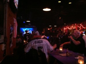 A testosterone-filled bar of football fans. So many screens in so many bars!
