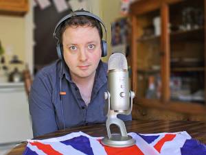 Laurence doing his podcast